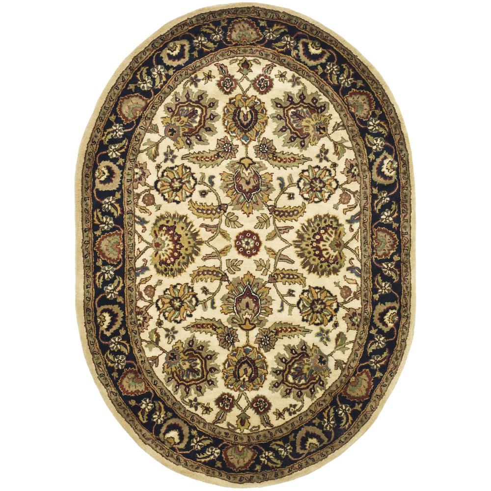 CLASSIC, IVORY / NAVY, 4'-6" X 6'-6" Oval, Area Rug. Picture 1