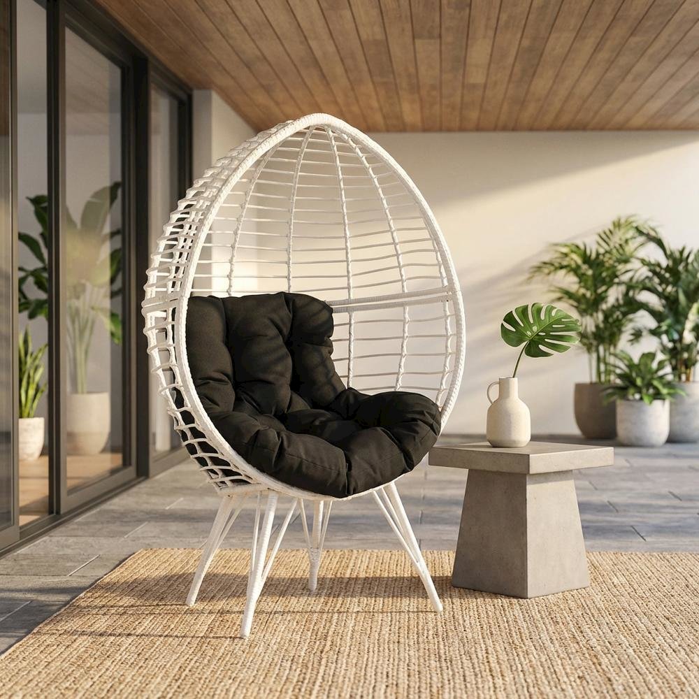 Black Patio Lounge Chair With Wicker Accents For Outdoor Comfort. Picture 2