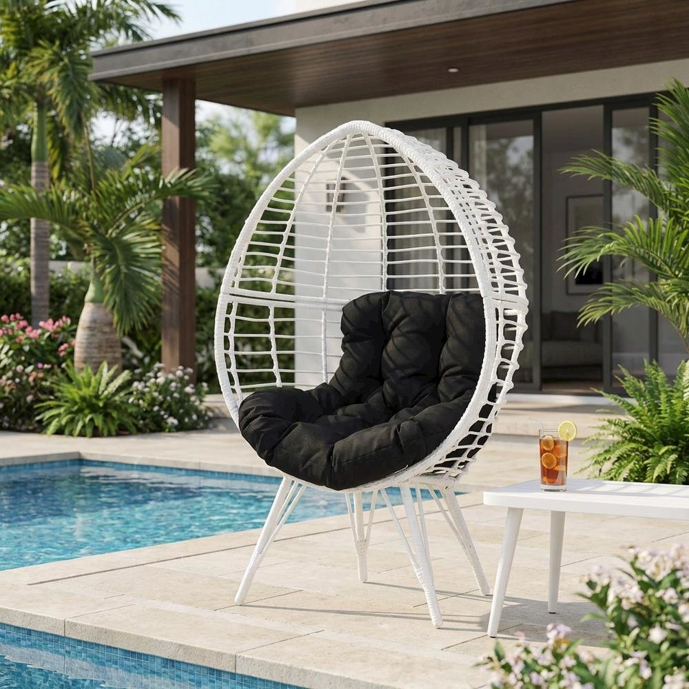 Black Patio Lounge Chair With Wicker Accents For Outdoor Comfort. Picture 3