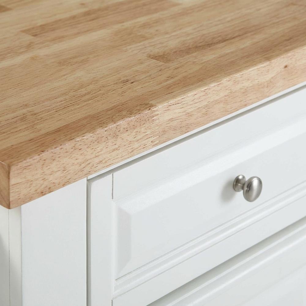 White kitchen island with butcher block top and anti-tip safety feature. Picture 6