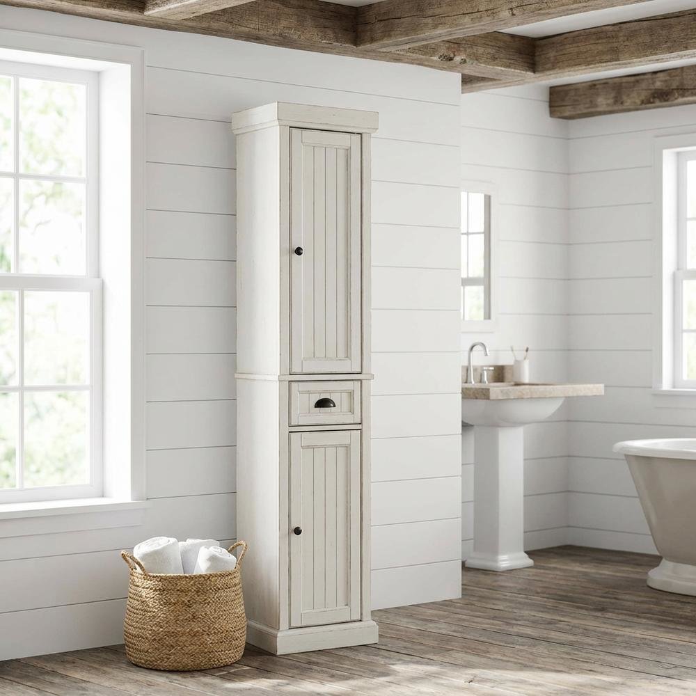 Tall linen cabinet in distressed white with anti-tip hardware. Picture 2