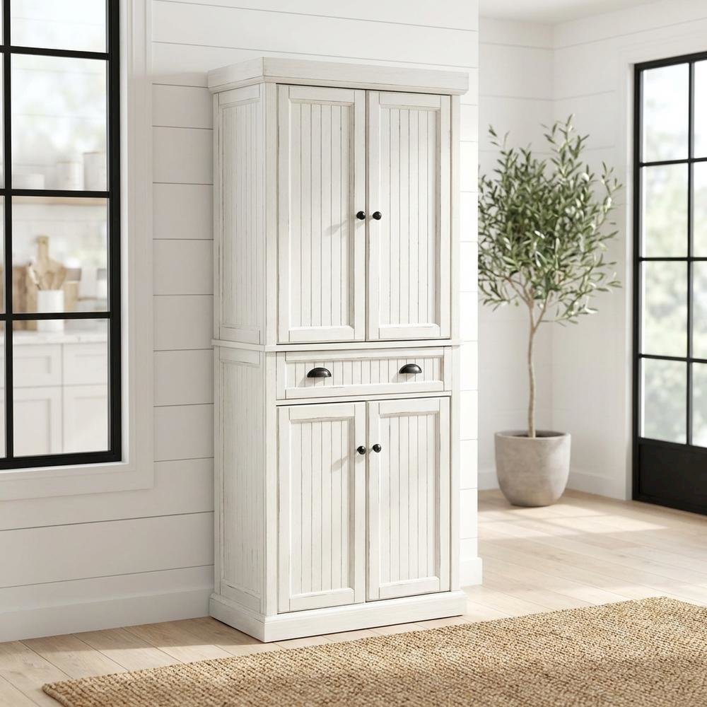White kitchen pantry cabinet with anti-tip safety feature, sturdy construction. Picture 2