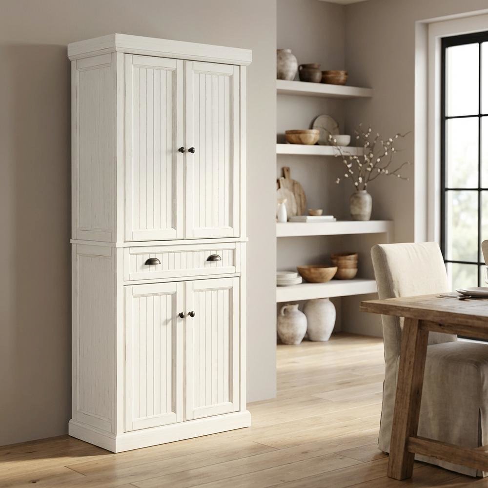 White kitchen pantry cabinet with anti-tip safety feature, sturdy construction. Picture 4