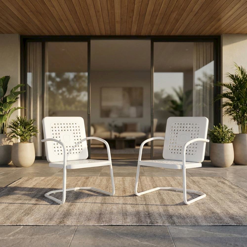 White outdoor armchair duo with sturdy construction and comfortable seating. Picture 2