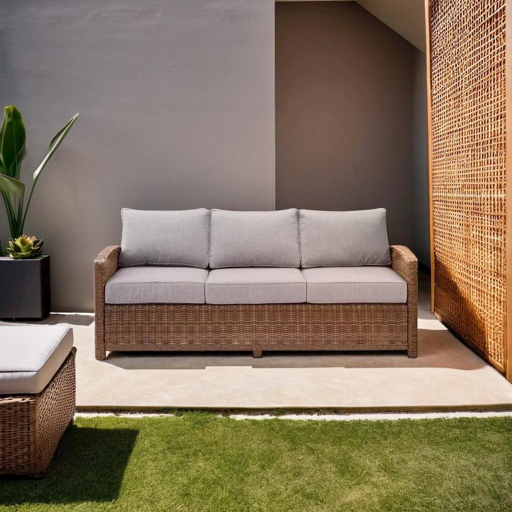 Elegant Beige Outdoor Sofa with All-Weather Resin Wicker Design. Picture 7