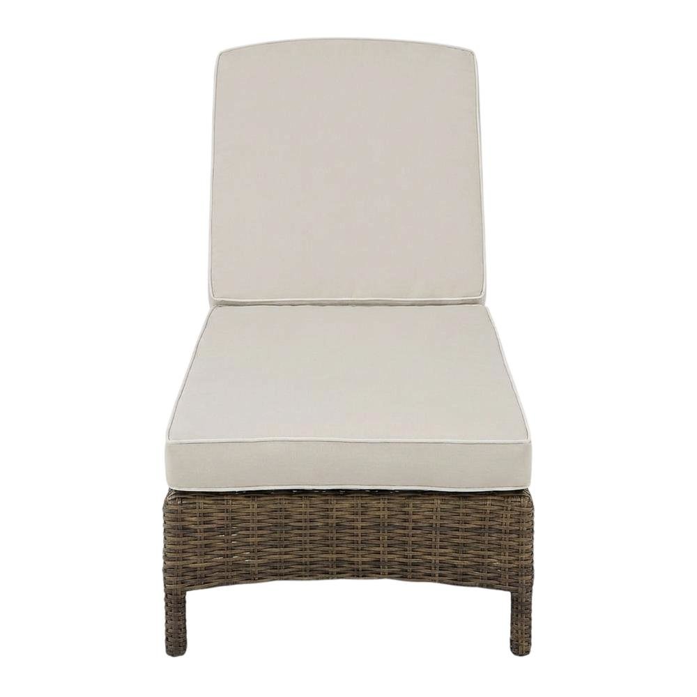 Sand-colored outdoor wicker chaise lounge with cushioned seat. Picture 4