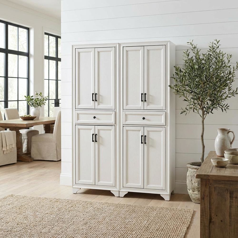 Distressed White Pantry Cabinets with Anti-Tip Mechanism and Floor Clearance. Picture 2