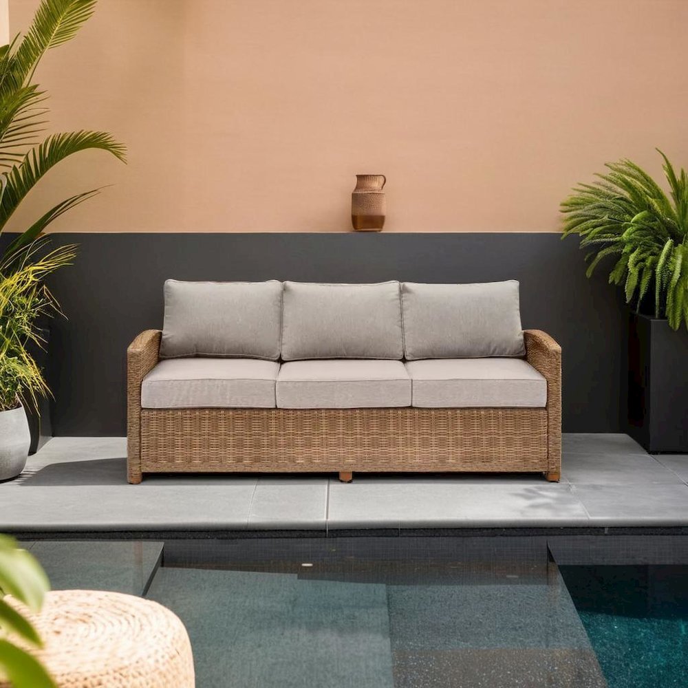 Elegant Beige Outdoor Sofa with All-Weather Resin Wicker Design. Picture 6
