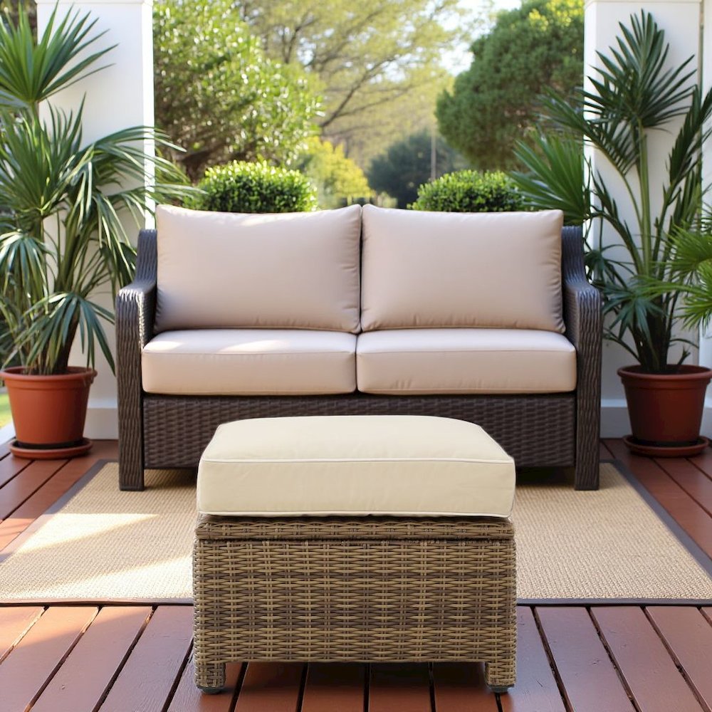 Brown Wicker Outdoor Ottoman with Sand Cushion – Foot Rest for Patio Lounging. Picture 3