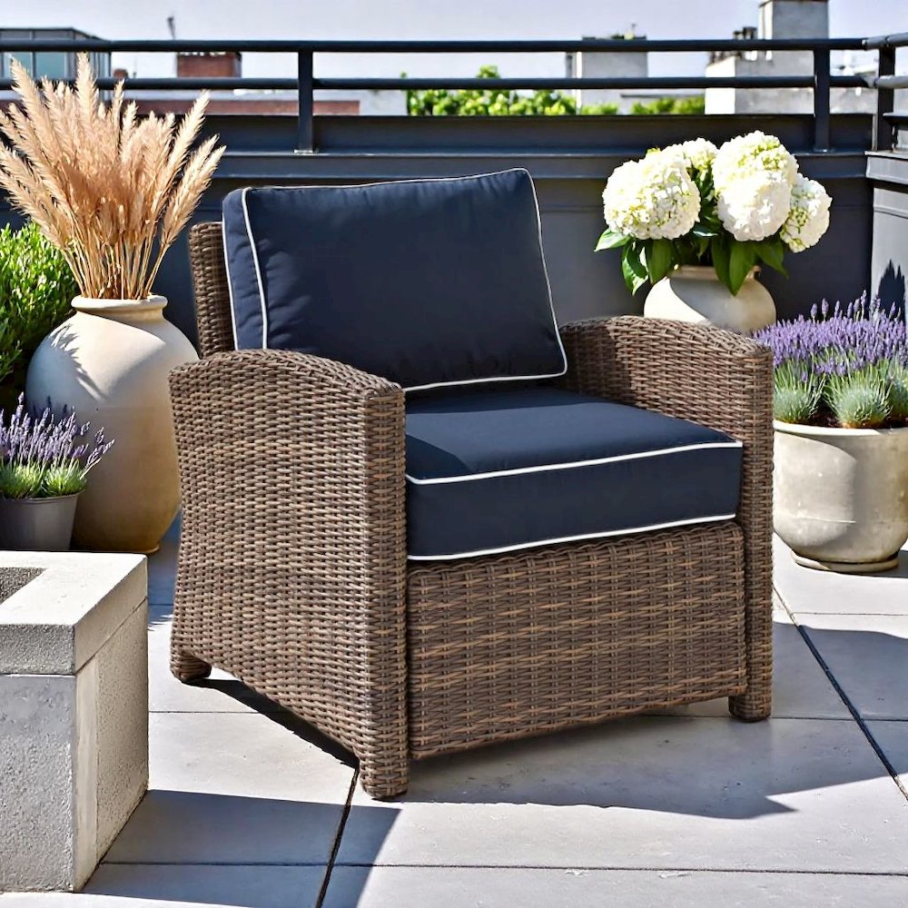 Wicker Patio Armchair with Navy Cushion for Outdoor Seating and Relaxation. Picture 2