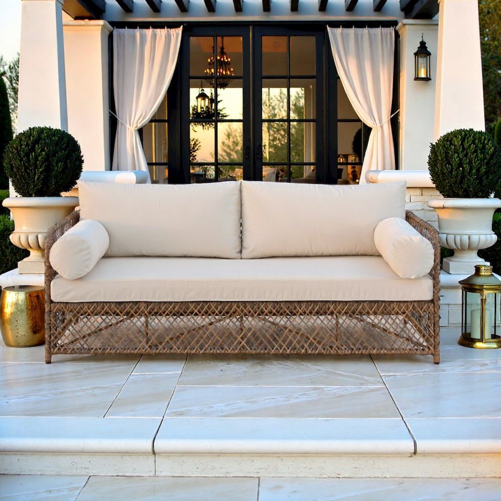 Wicker Outdoor Sofa with Creme Cushions for Patio Relaxation and Garden Seating. Picture 4