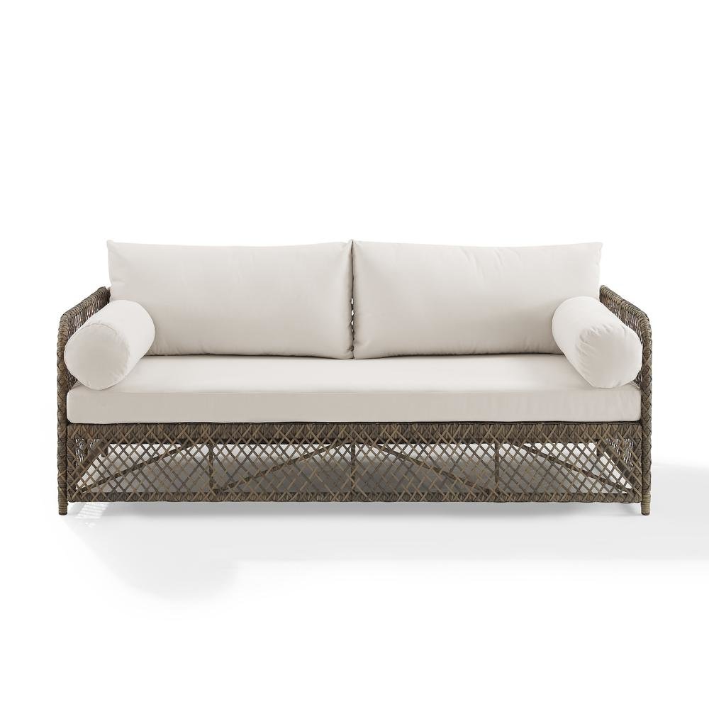 Wicker Outdoor Sofa with Creme Cushions for Patio Relaxation and Garden Seating. Picture 6