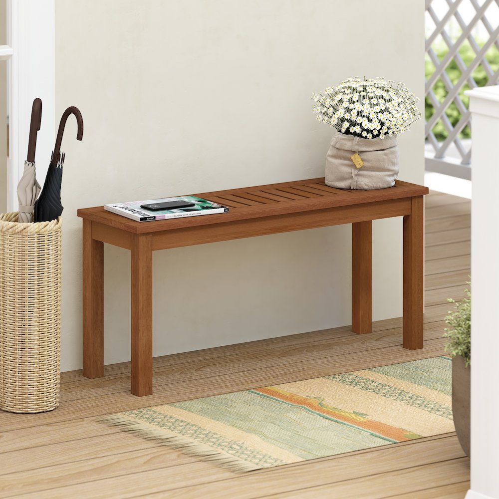 Tioman Hardwood Outdoor Backless Country Stool Bench in Teak Oil, Natural. Picture 6