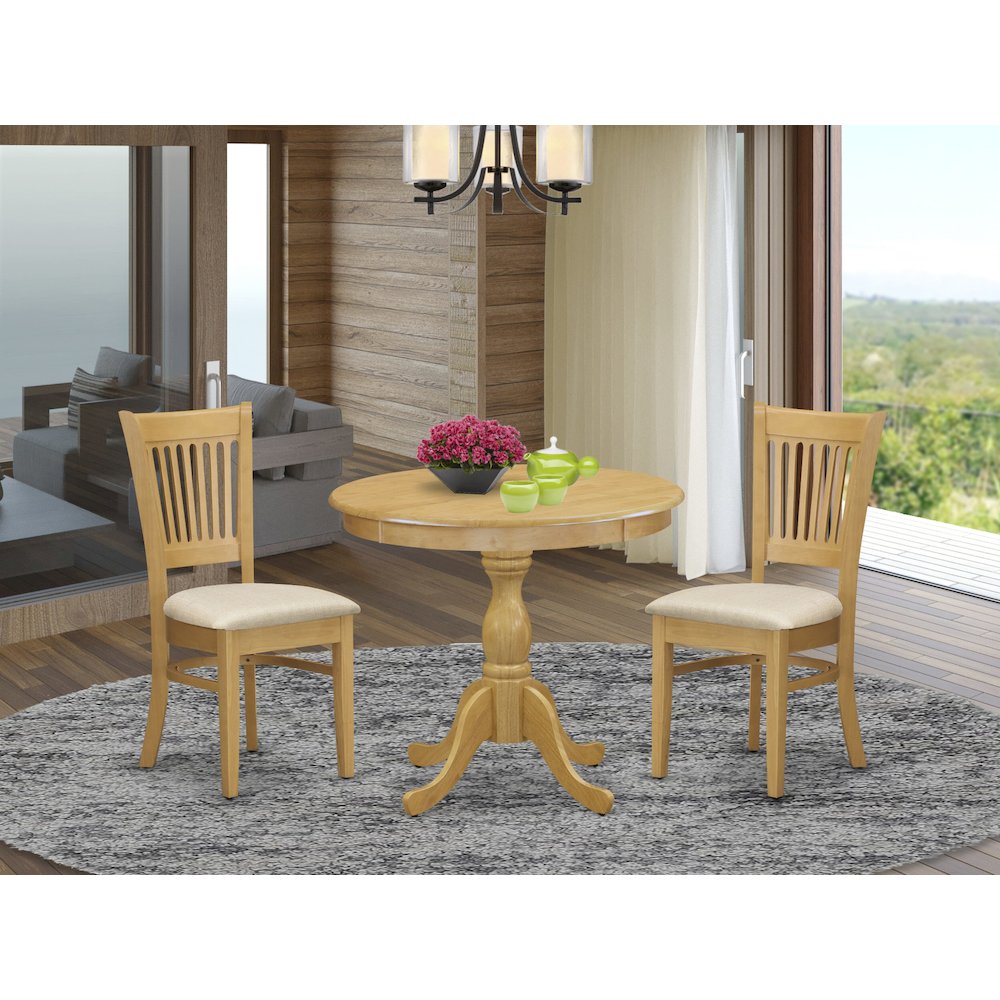 East West Furniture 3 Piece Dining Table Set Contains 1 Round Pedestal Table and 2 Oak Linen Fabric Wooden Kitchen Chairs with Slatted Back - Oak Finish. Picture 2