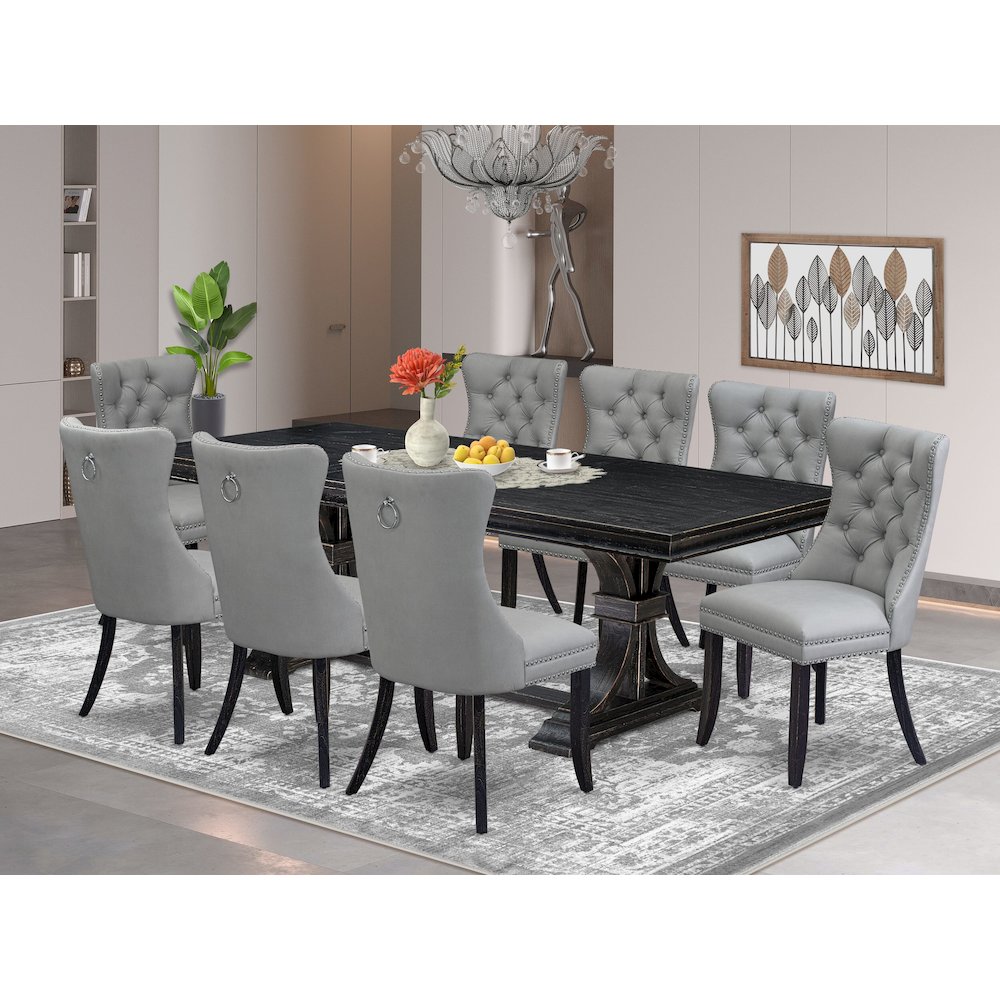 9 piece kitchen table set a dinner table and 8 Faux Leather dining Chairs. Picture 5
