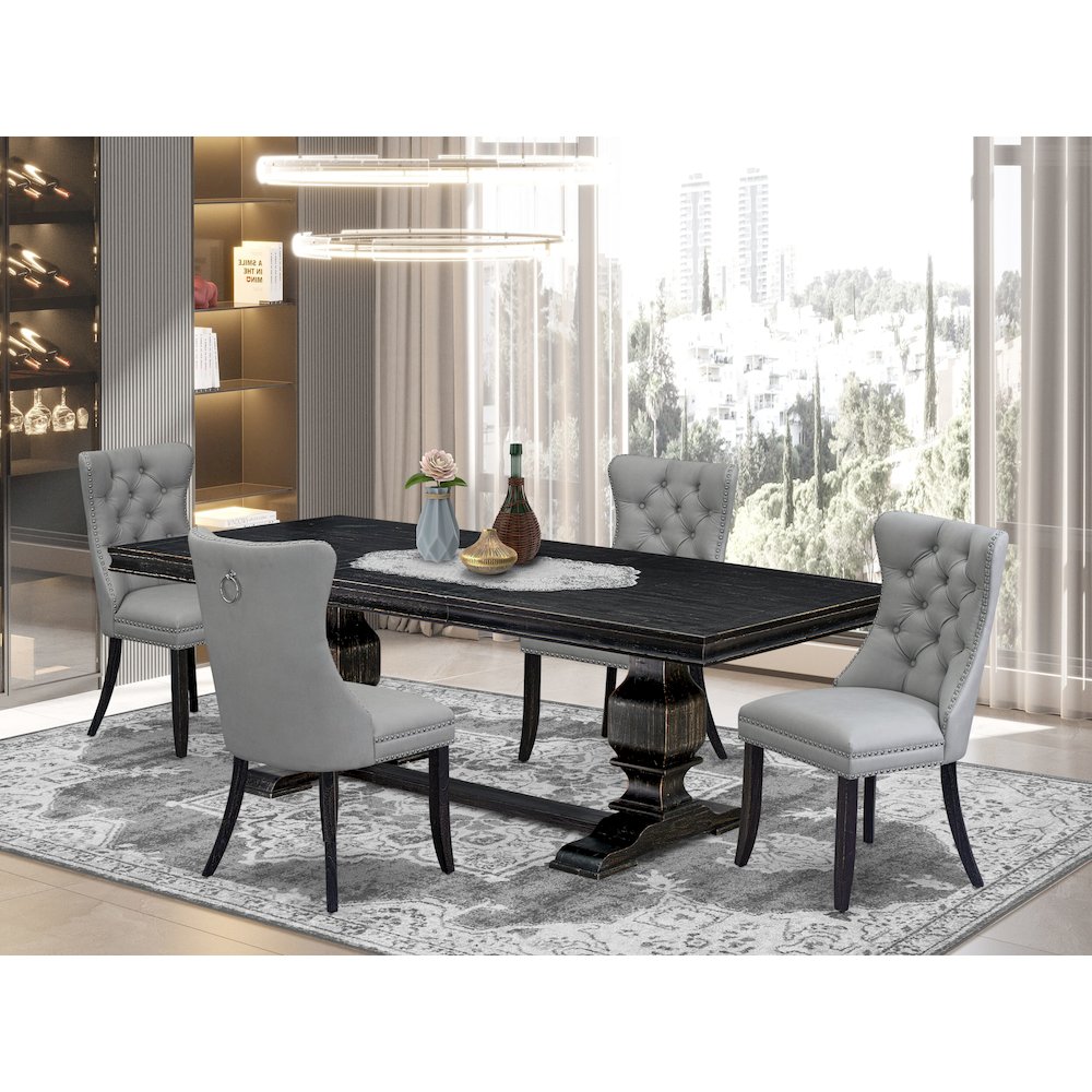 5 piece dining set includes a wooden table and 4 Faux Leather parson chairs. Picture 5