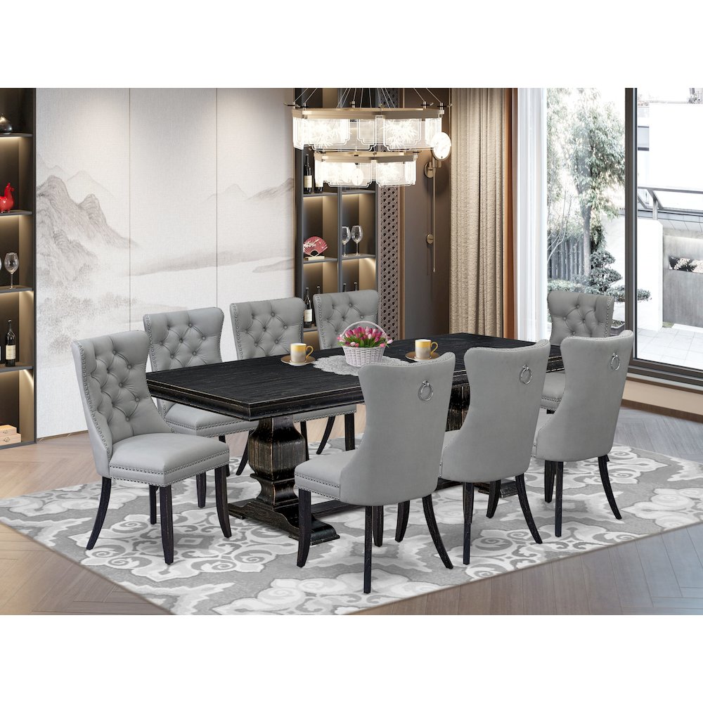 9 piece dining set a rectangular table and 8 Faux Leather dining Chairs. Picture 5