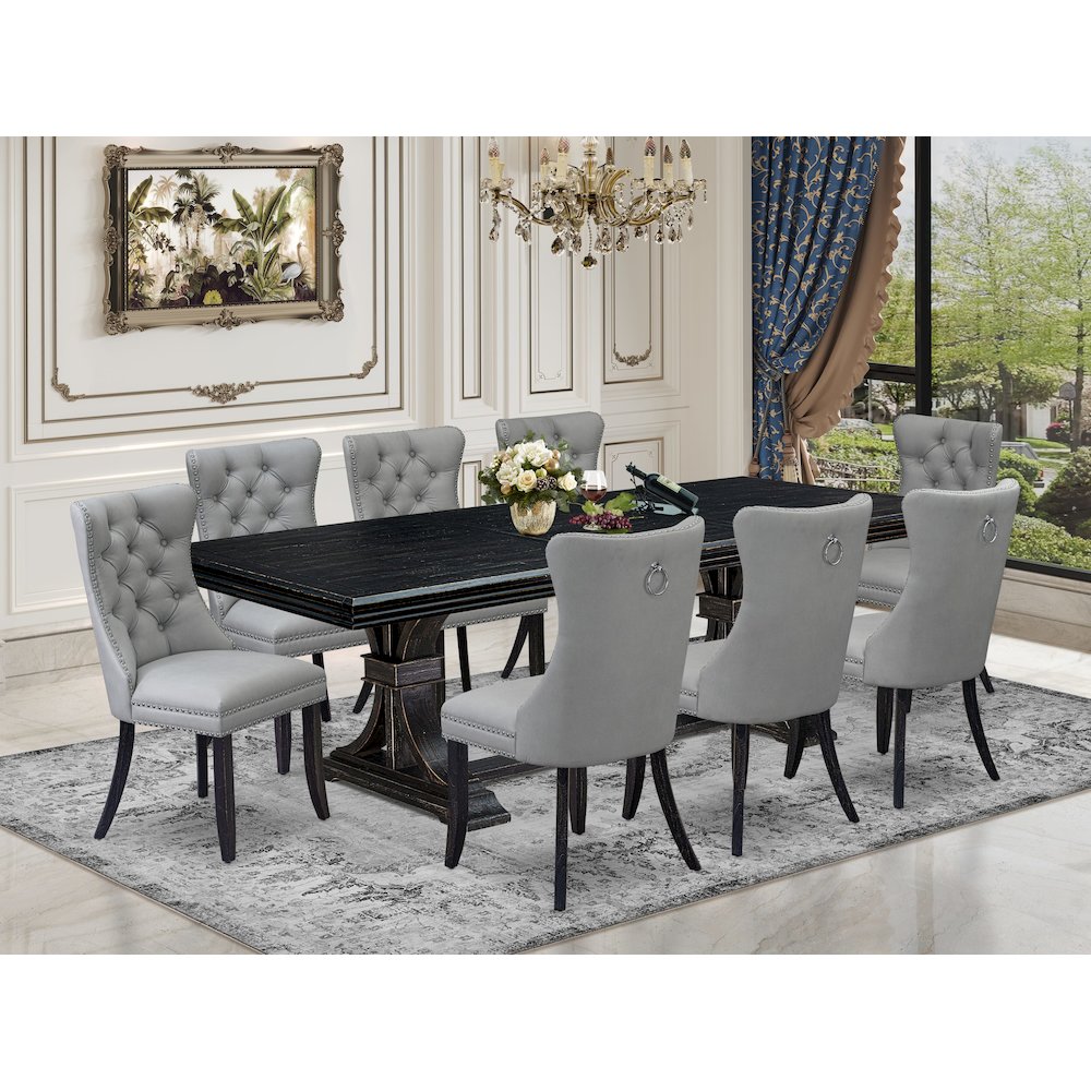 9 piece dining table set a dining table and 8 Faux Leather kitchen Chairs. Picture 5