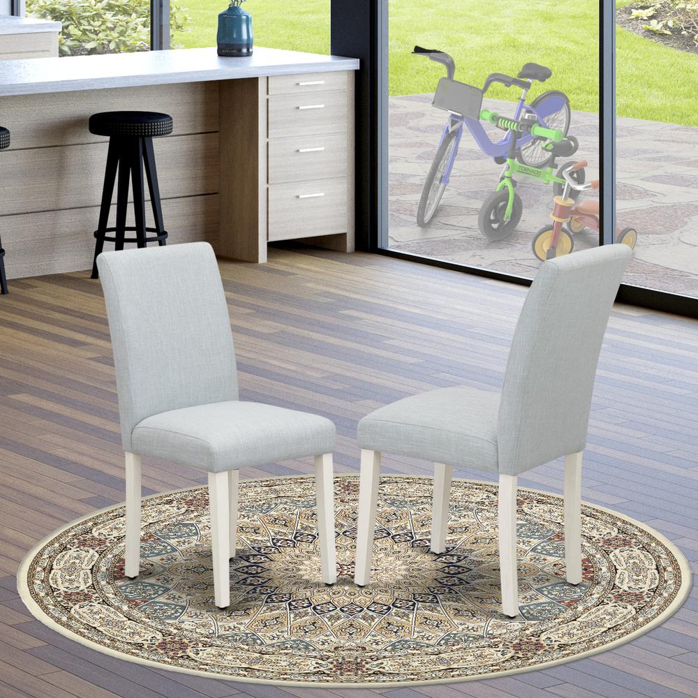 East West Furniture 5-Piece Dining Set Includes 4 Dining Room Chairs with Upholstered Seat and High Back and a Rectangular Dining Table - Linen White Finish. Picture 3