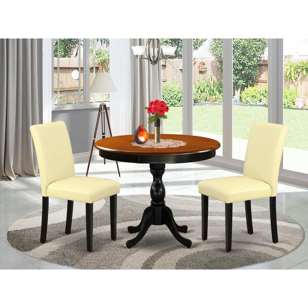 East West Furniture 3-Pc Dining Room Set Consists of a Mid Century Dining Table and 2 Eggnog PU Leather Parsons Chairs with High Back - Black Finish. Picture 2