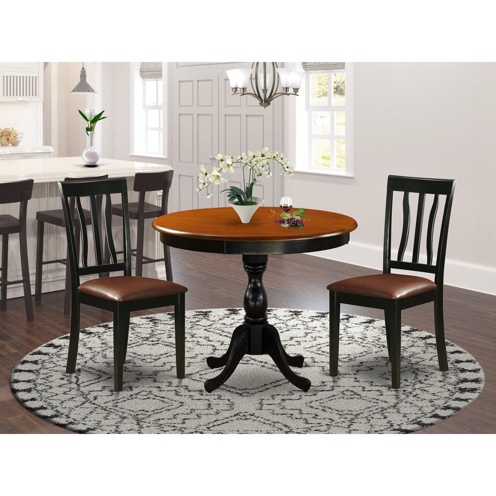 East West Furniture 3-Piece Dining Room Table Set Consists of a Modern Kitchen Table and 2 Faux Leather Kitchen Chairs with Slatted Back - Black Finish. Picture 2