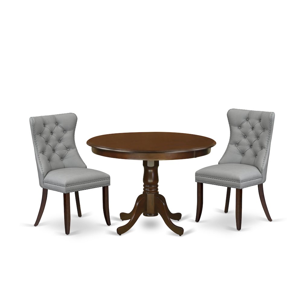 3 Piece Dining Set Consists of a Round Kitchen Table with Pedestal. Picture 1