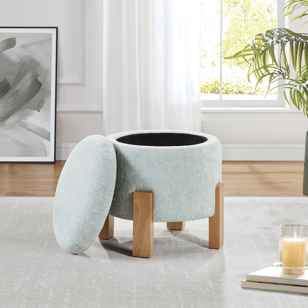 Annie Storage Ottoman in Sky Fabric with Natural Finish Legs. Picture 5
