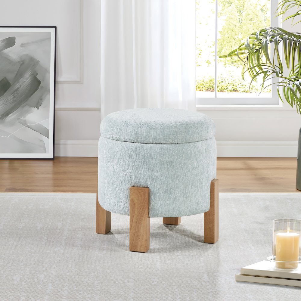 Annie Storage Ottoman in Sky Fabric with Natural Finish Legs. Picture 4