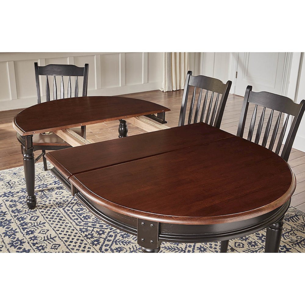 British Isles 52" - 76" Oval Dining Table with (2) 12" Leaves, Oak-Black Finish. Picture 5