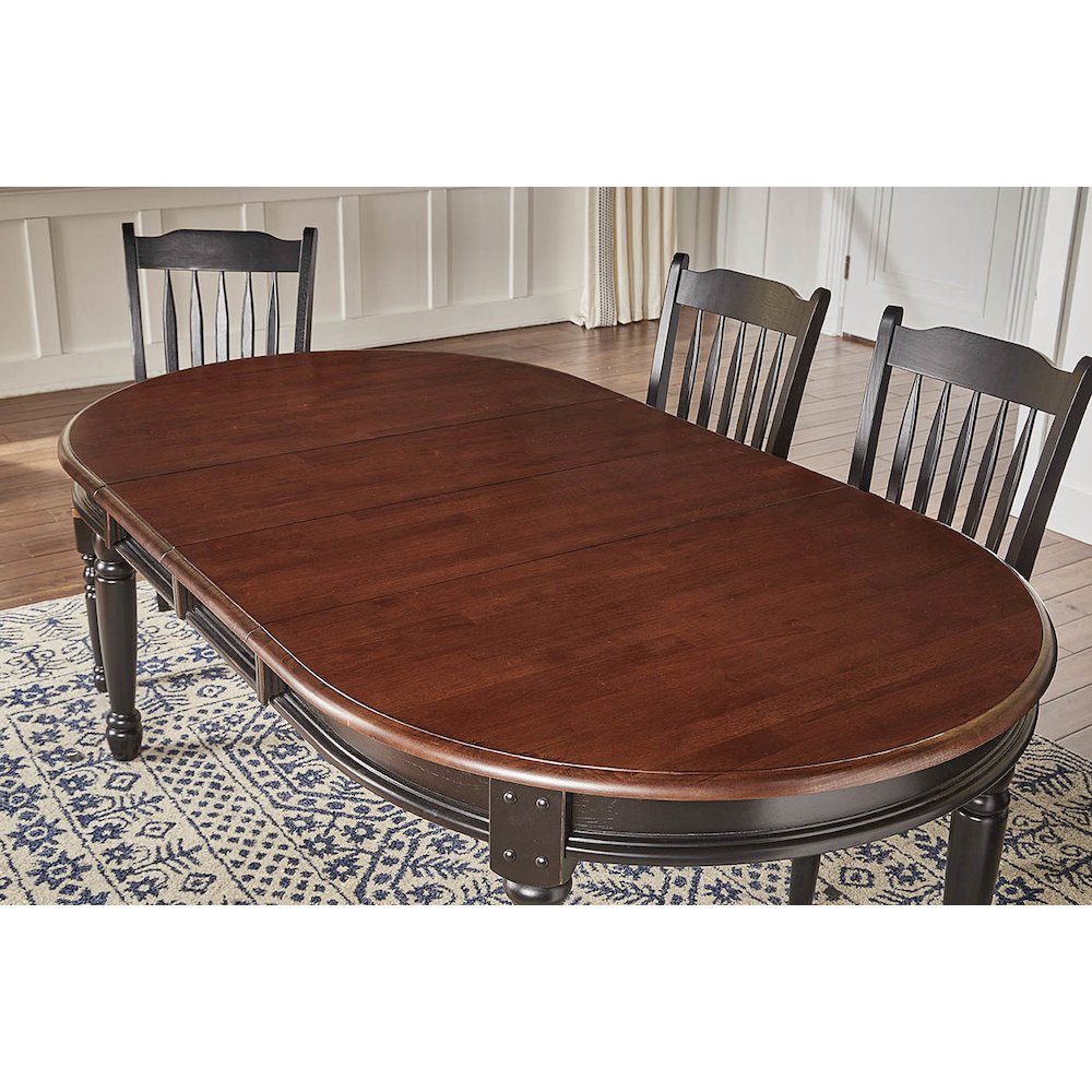 British Isles 52" - 76" Oval Dining Table with (2) 12" Leaves, Oak-Black Finish. Picture 4