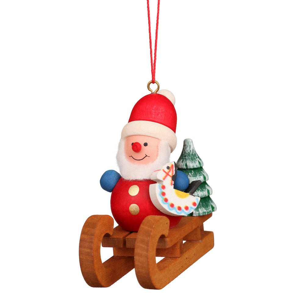 Ornament - Santa On Sled. Picture 1