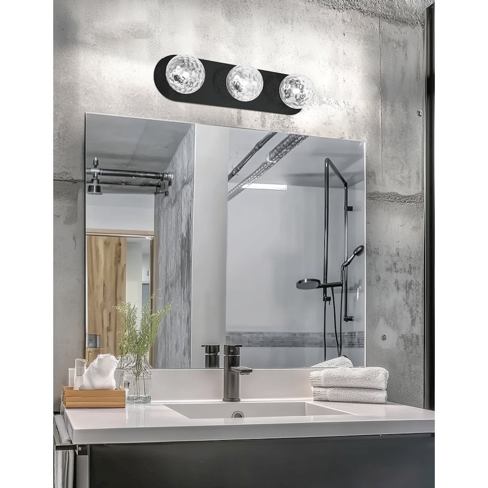 3 Light Vanity in Matte Black w/ Clear Hammered Glass. Picture 3
