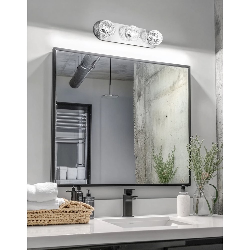 3 Light Vanity in Polished Chrome w/ Clear Hammered Glass. Picture 3