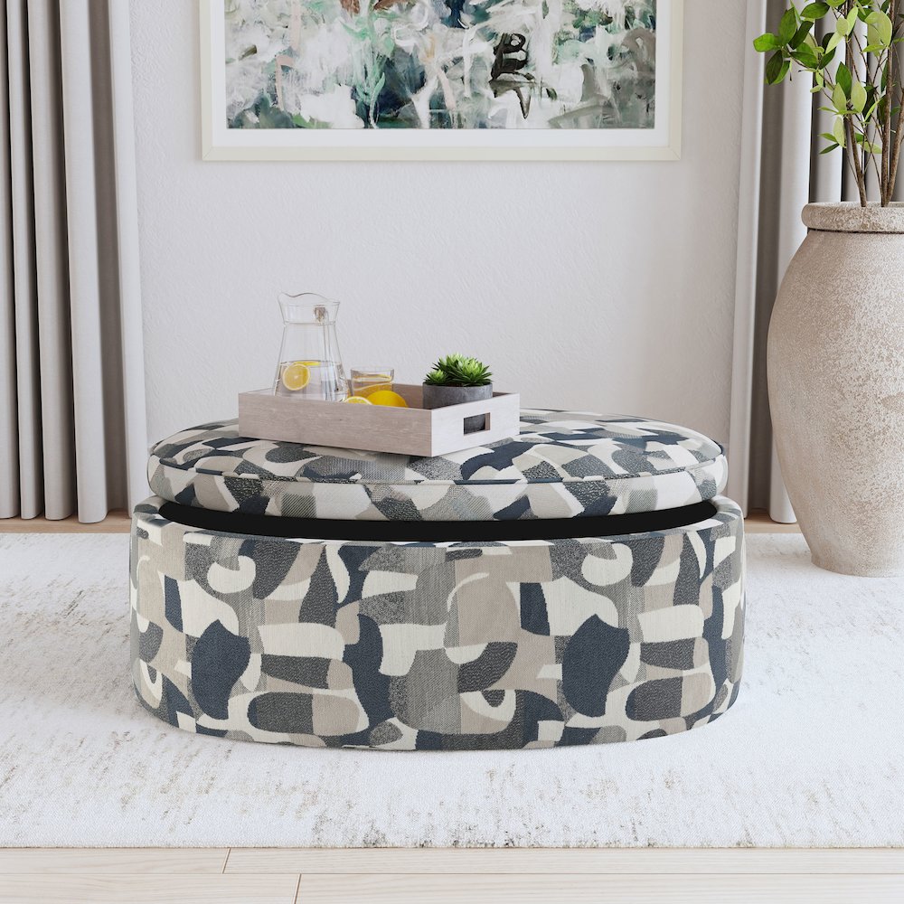 Tomkins Oval Upholstered Storage Ottoman Indigo Blue. Picture 9