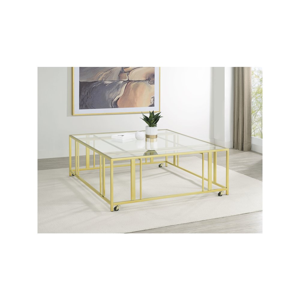 Adri Square Glass Top Coffee Table with Casters Matte Brass. Picture 6