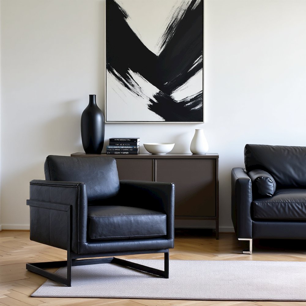 Modern Armchair with Black Leather Seat and Sturdy Metal Frame. Picture 2