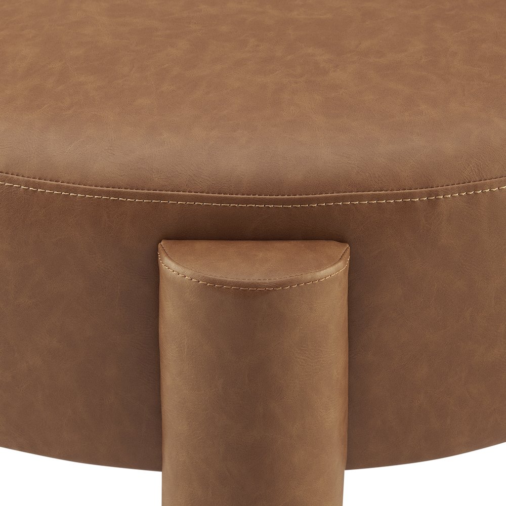Elora Faux Leather Round Ottoman. Picture 4