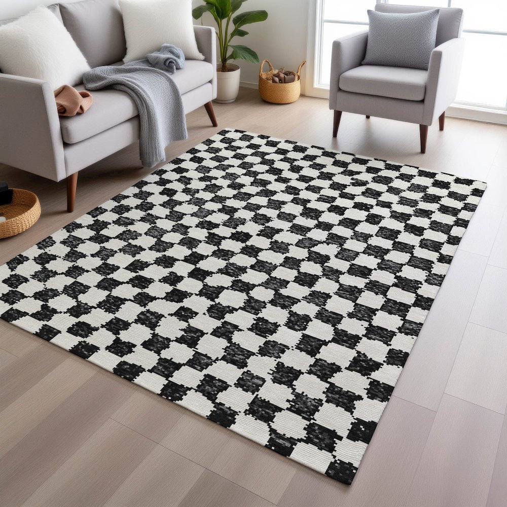 Machine Washable Indoor/Outdoor Chantille Black 5' x 7'6" Rug. Picture 5