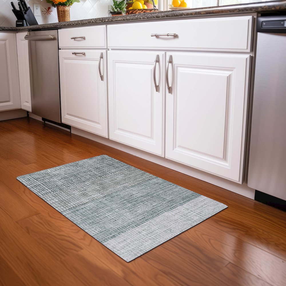 Machine Washable Indoor/Outdoor Chantille Aqua 1'8" x 2'6" Rug. Picture 5