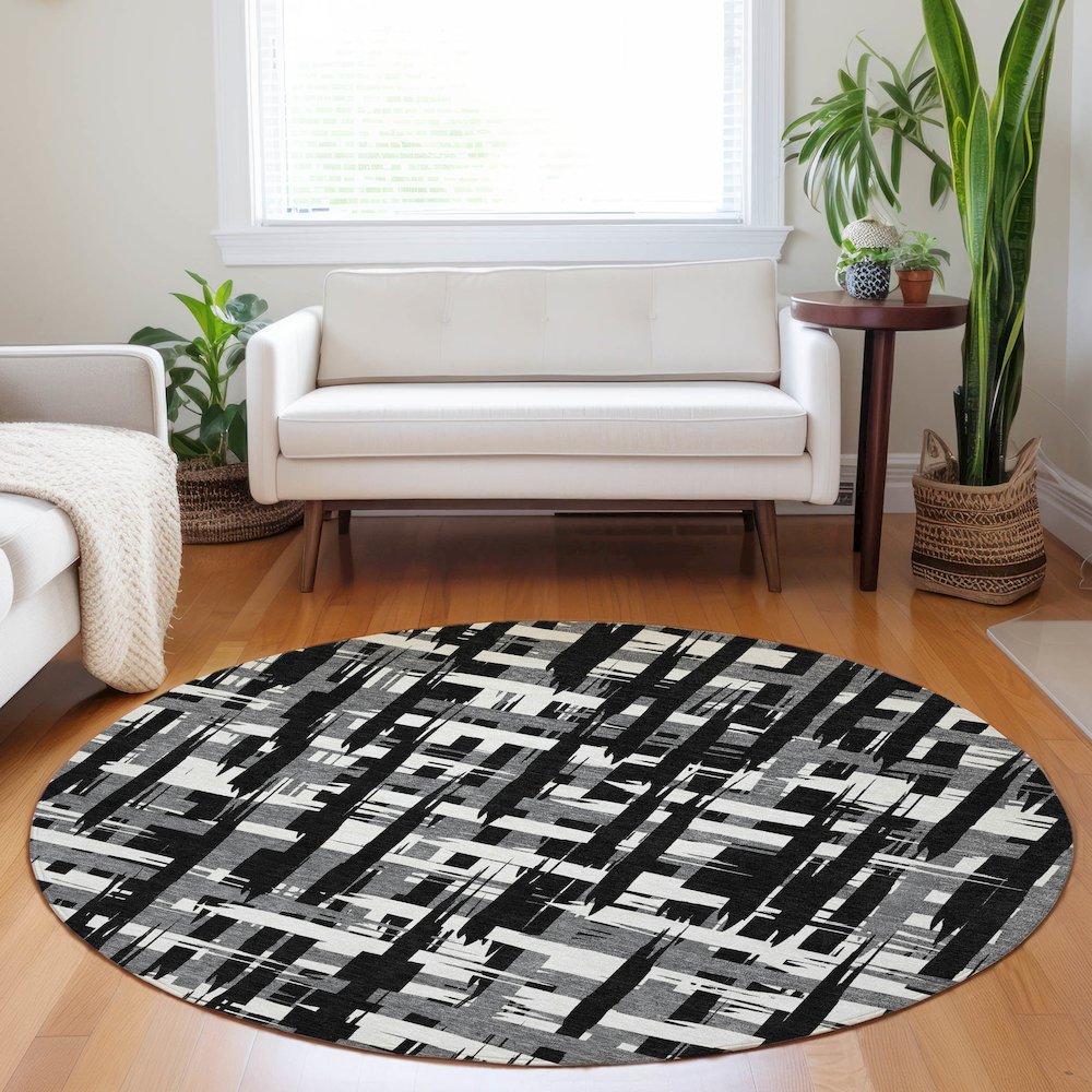 Machine Washable Indoor/Outdoor Chantille Black 8' x 8' Round Rug. Picture 5
