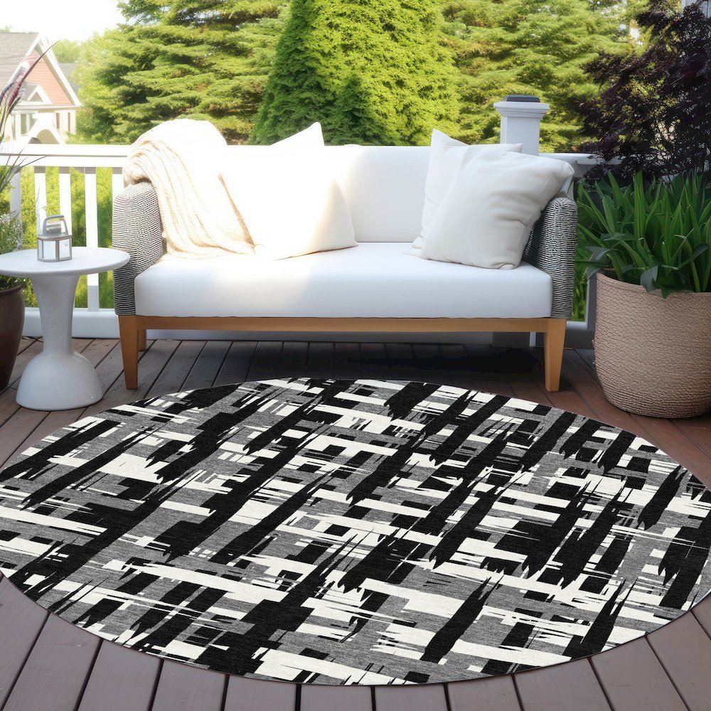 Machine Washable Indoor/Outdoor Chantille Black 8' x 8' Round Rug. Picture 6