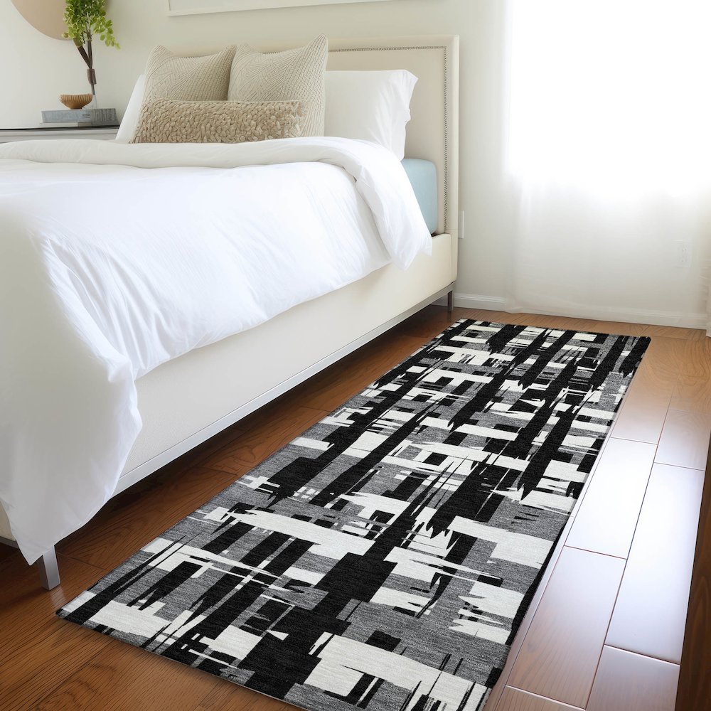 Machine Washable Indoor/Outdoor Chantille Black 2'3" x 7'6" Runner Rug. Picture 5