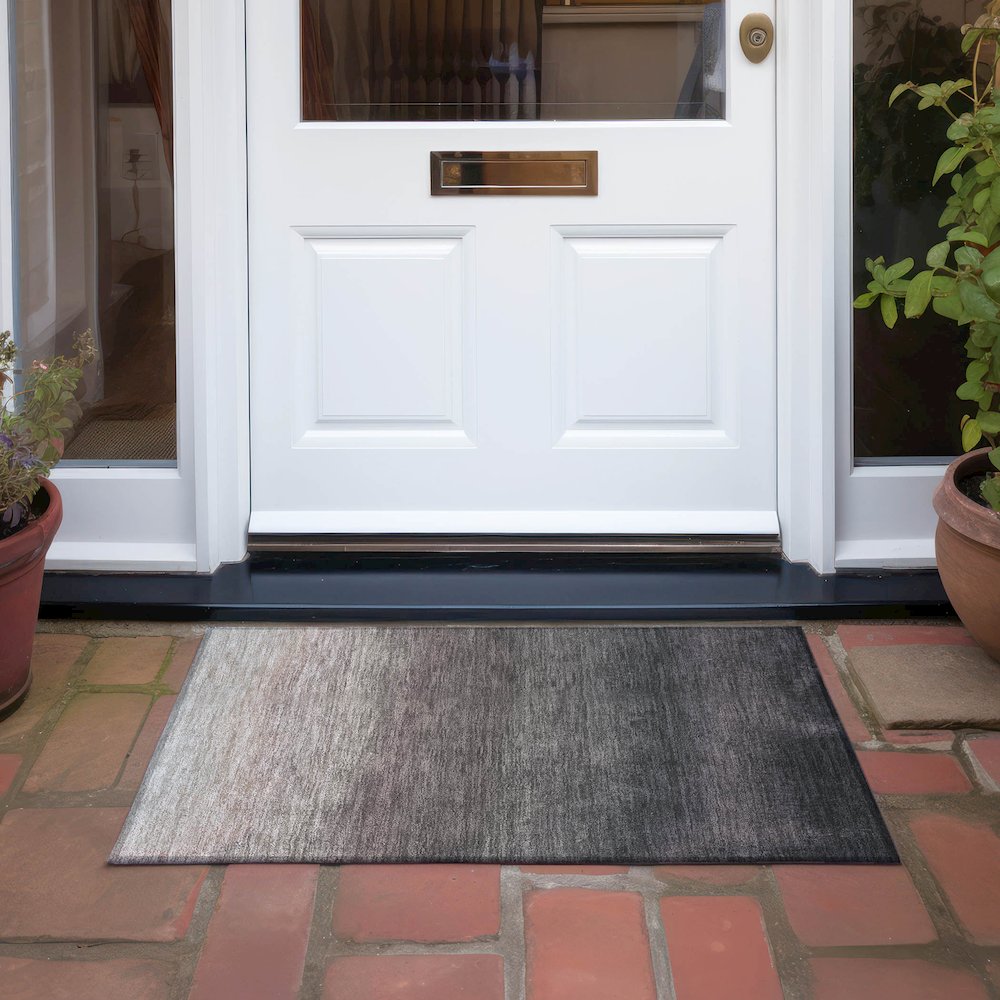 Machine Washable Indoor/Outdoor Chantille Black 1'8" x 2'6" Rug. Picture 6