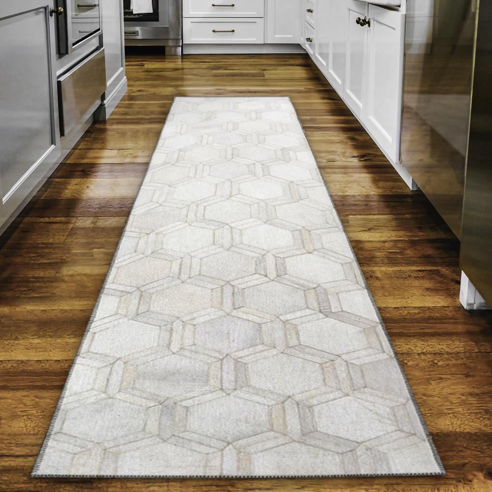 Laredo Ivory Animal Patchwork 2'3" x 7'6" Runner Rug Ivory ALR31. Picture 1