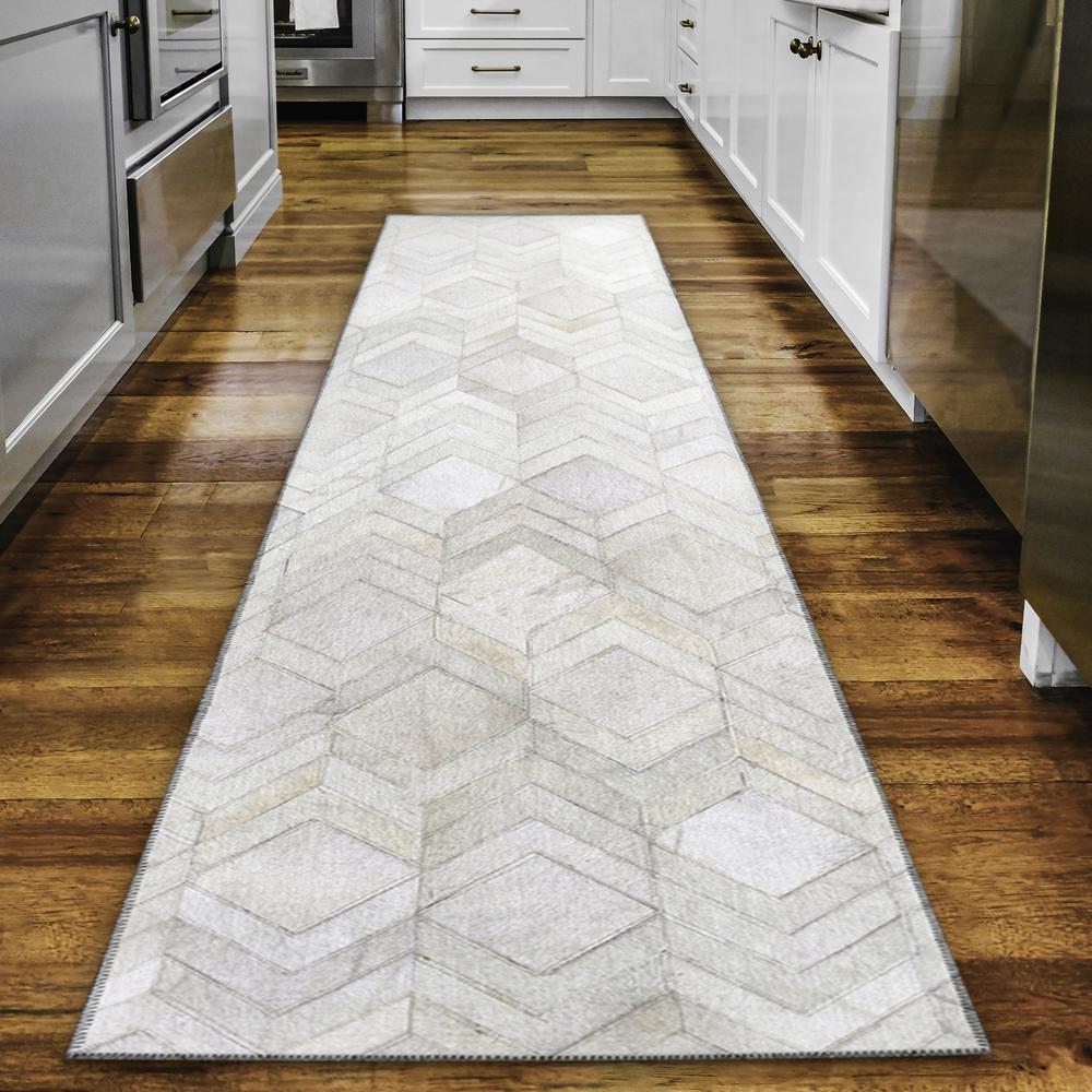 Laredo Ivory Animal Patchwork 2'3" x 7'6" Runner Rug Ivory ALR35. Picture 1