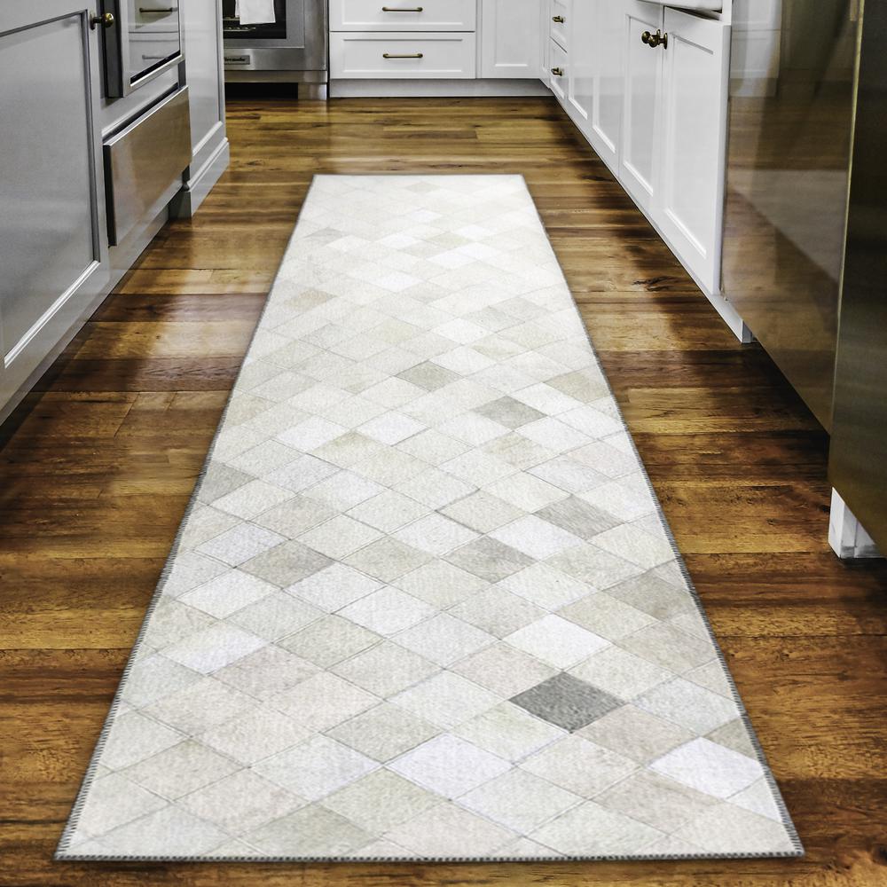 Laredo Ivory Animal Patchwork 2'3" x 7'6" Runner Rug Ivory ALR32. Picture 1