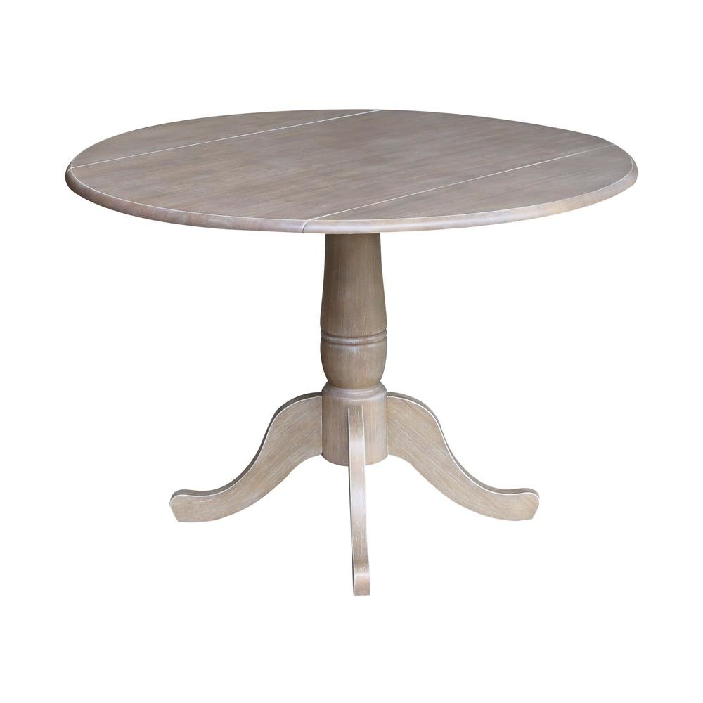 42" Round Dual Drop Leaf Pedestal Table - 29.5"H. Picture 1