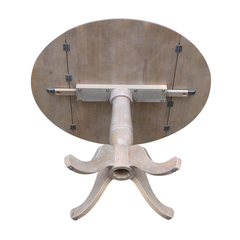 42" Round Dual Drop Leaf Pedestal Table - 29.5"H. Picture 2