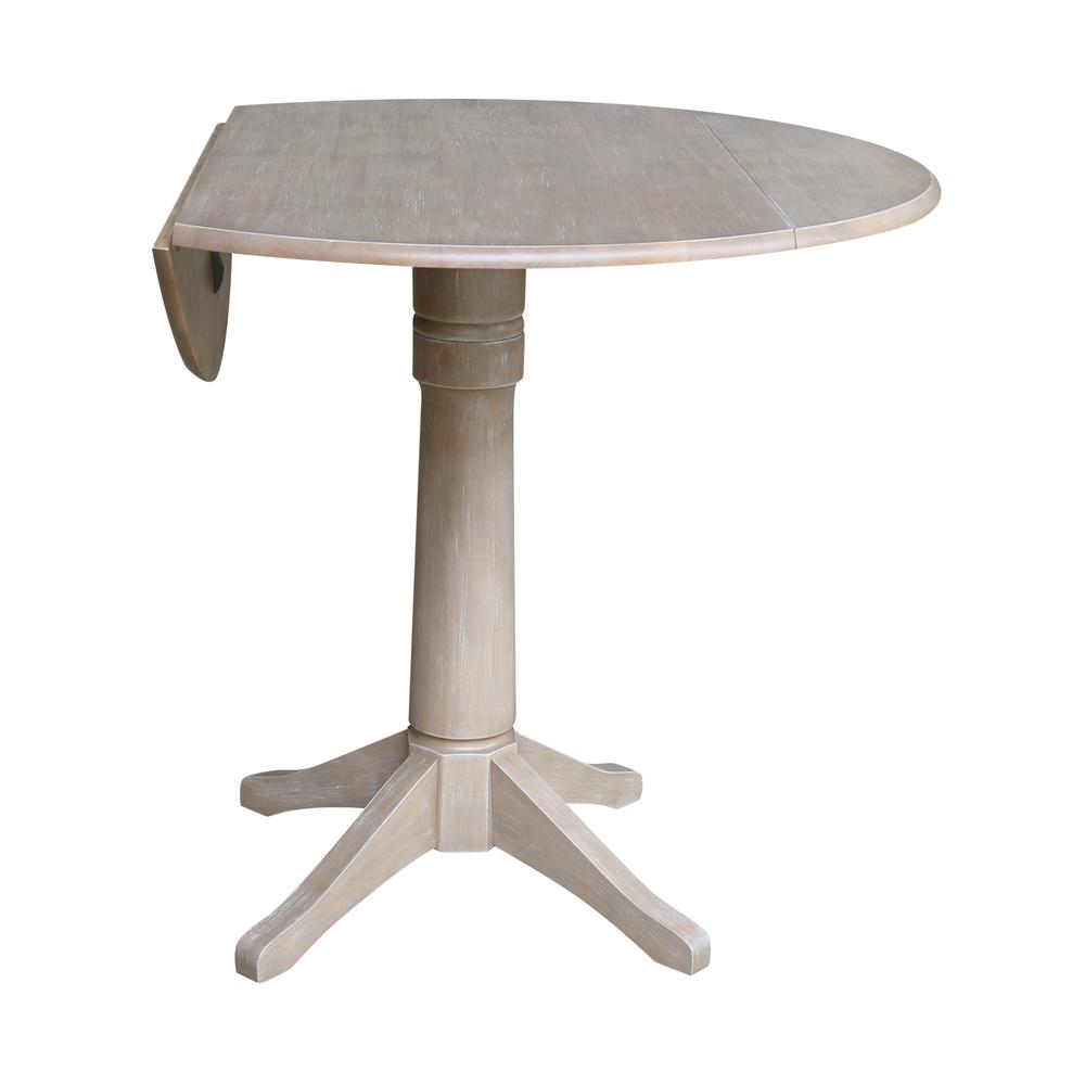 42" Round Dual Drop Leaf Pedestal Table - 30.3"H. Picture 9