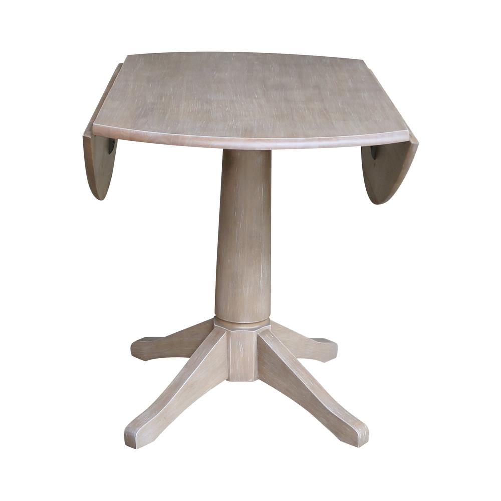 42" Round Dual Drop Leaf Pedestal Table - 30.3"H. Picture 6